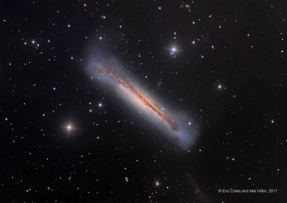 Секреты космической "спиральки" NGC 3628 